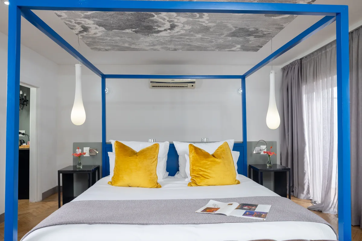 Mountain View Room four-poster bed at Majeka House Boutique Hotel
