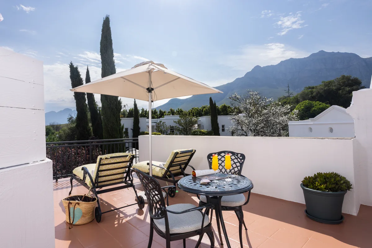 Terrace with a mountain view at Majeka House Boutique Hotel