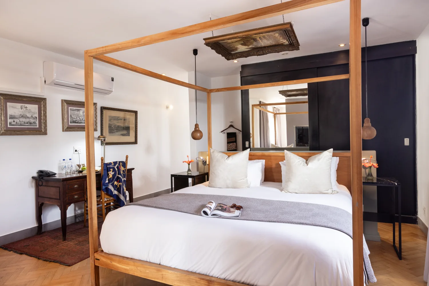 Mountain View Suite with timber four-poster bed at Majeka House Boutique Hotel